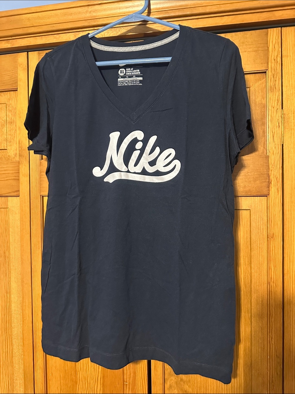Nike Women's Navy V-Neck Tee with White Logo